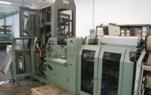 Imagen parte de una máquina de hacer tapas duras